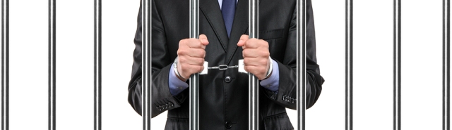 handcuffed businessman