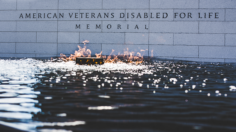 "DC has many monuments and memorials rightly dedicated to Veterans both living and lost. Here, the American Veterans Disabled for Life Memorial features a burning flame rising out of a dark pool of water; a stark and hauntingly beautiful visualization of the enduring memory of their sacrifice for freedom."