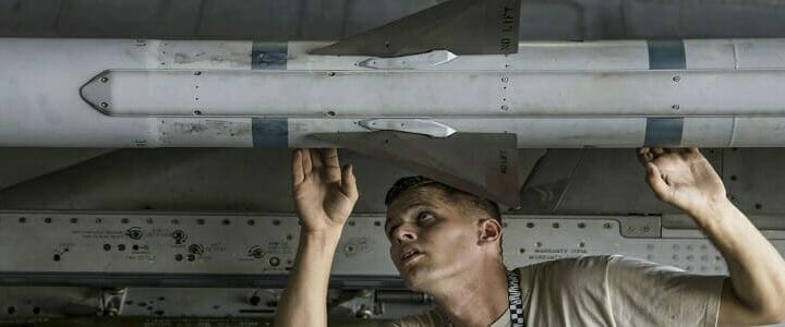 Air Force Staff Sgt. Jeffrey Kohler inspects an AIM-120 advanced medium-range air-to-air missile