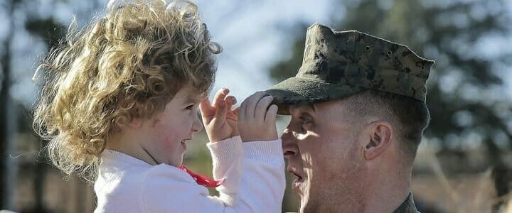 Marine with daughter outside