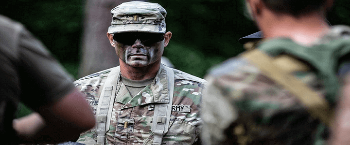 men in uniform one with face paint