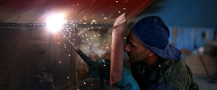 stock photo of man welding