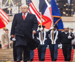 President Trump walking down stairs a American Commemoration Ceremony in Paris