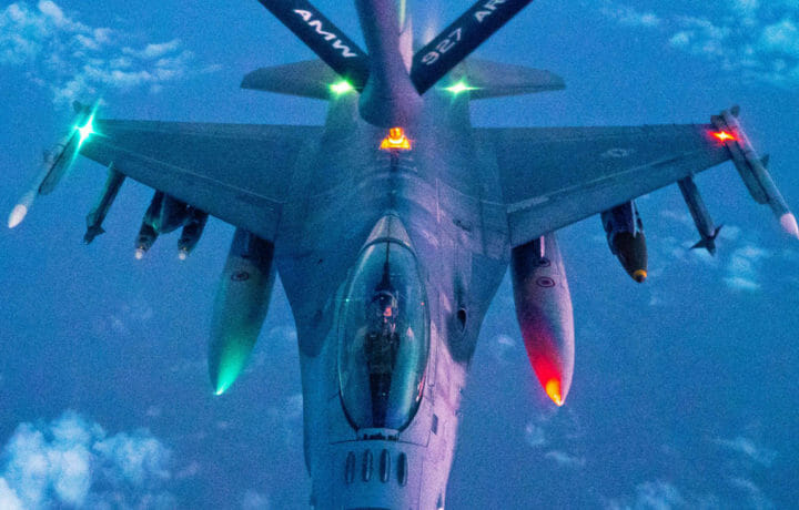 Air Force jet flying at night