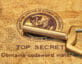 Golden key laying on folder reading top secret