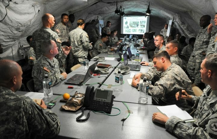 Planning meeting in US military tent