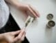 Woman rolling marijuana joint
