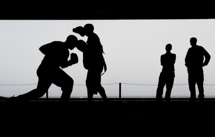 Silhouette of man boxing training