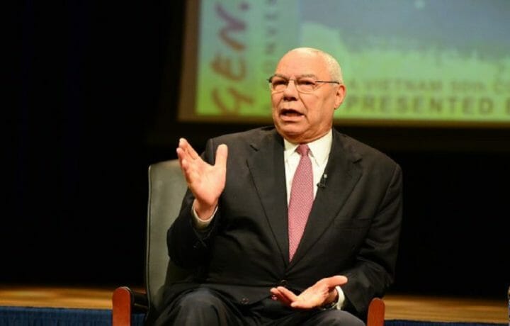 Collin Powell talking on a stage