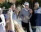 Supporters posing for photo with President Trump at Mar-a-Lago