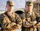 Pvt. Chris Griffin and Command Sgt. Maj. Ian Griffin posing