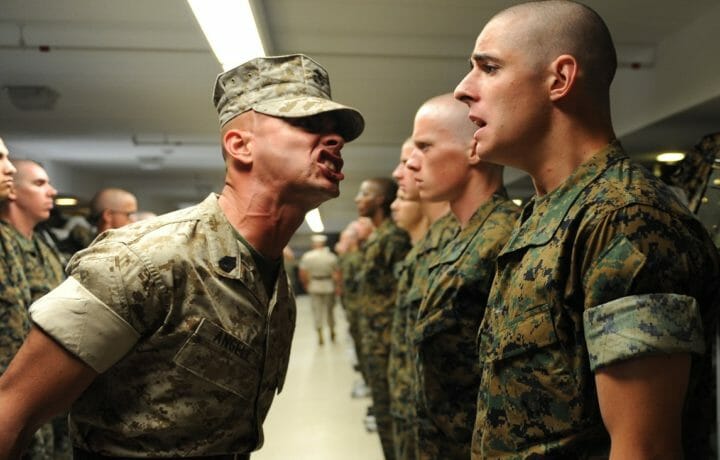 Drill sergeant yelling at boot camp cadet