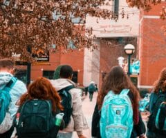 College students with blue backpacks