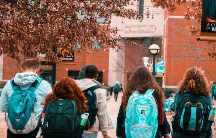 College students with blue backpacks