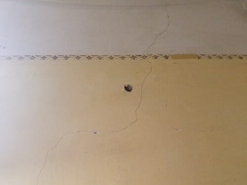 a bullet hole in the wall of Leon Trotsky's house