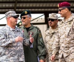 Col. Albert J. Ricci Sr., commander of the 42nd Combat Aviation Brigade (CAB), speaks to Maj. Gen. Prince Fahad bin Turki Abdulaziz Al-Saud, Royal Saudi Land Forces