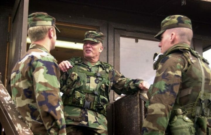 Then-Sgt. Maj. of the Army Jack L. Tilley (center) speaks with interpreter Behar Gashi (left) and Army Spc. Tom Hanelly of Company B, 2nd Battalion, 112th Infantry Regiment, 28th Infantry Division