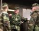 Then-Sgt. Maj. of the Army Jack L. Tilley (center) speaks with interpreter Behar Gashi (left) and Army Spc. Tom Hanelly of Company B, 2nd Battalion, 112th Infantry Regiment, 28th Infantry Division