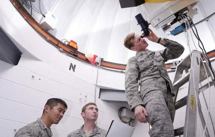 Seniors Kuo-Liang Cheng, Matthew Miller and Daniel Weisz work on a 16-inch telescope at the U.S. Air Force Academy's Observatory in Colorado Springs, Colorado, Dec. 9, 2016. This telescope is capable of tracking man-made satellites and detecting planets around other stars. (U.S. Air Force photo/ Mike Kaplan)