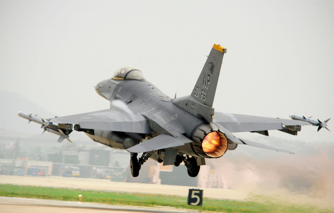 F-16 Fighting Falcons fly overhead during the New York Jets