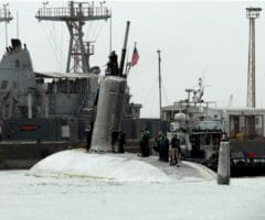 The Los Angeles-class attack submarine USS Hartford arrives pier side at Mina Salman pier in Bahrain where U.S. Navy engineers and inspection teams will assess and evaluate damage that resulted from a collision with the amphibious transport dock ship USS New Orleans in the Strait of Hormuz, March 20. Overall damage to both ships is being evaluated. The incident remains under investigation. Hartford is deployed to the U.S. 5th fleet area of responsibility to support maritime security operations.