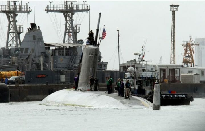 The Los Angeles-class attack submarine USS Hartford arrives pier side at Mina Salman pier in Bahrain where U.S. Navy engineers and inspection teams will assess and evaluate damage that resulted from a collision with the amphibious transport dock ship USS New Orleans in the Strait of Hormuz, March 20. Overall damage to both ships is being evaluated. The incident remains under investigation. Hartford is deployed to the U.S. 5th fleet area of responsibility to support maritime security operations.