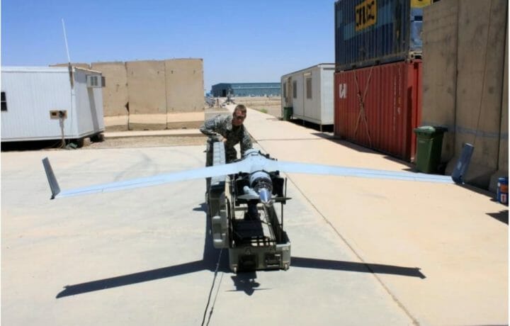 Sgt. Michael Diamondson, the mission commander for ScanEagle Operations, is seen here at Camp Taji, Iraq, with a ScanEagle unmanned aerial system.