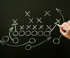 Coach Drawing American Football Playbook Tactics