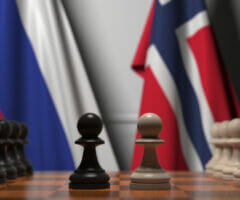 Flags of Russia and Norway behind pawns on the chessboard. Chess game or political rivalry related 3D rendering