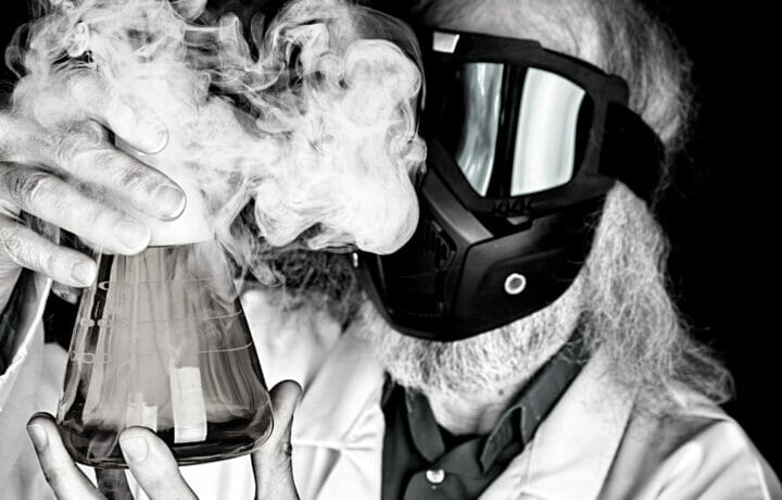 scientist in lab with gas mask