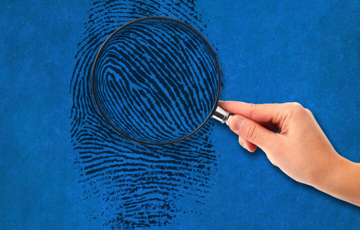 magnifying glass over fingerprint