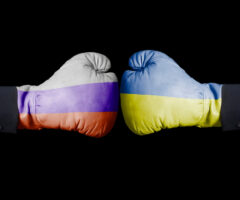 Boxing gloves with Russian and Ukrainian flag