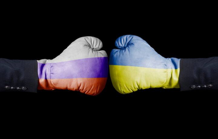Boxing gloves with Russian and Ukrainian flag