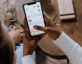 person using smartphone with tiktok app