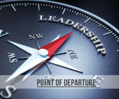 Compass pointing north to leadership