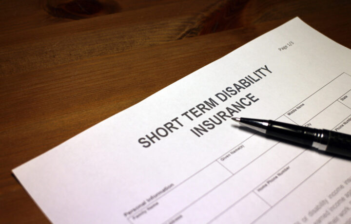 short-term disability application insurance with pen
