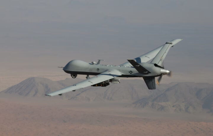 An MQ-9 Reaper, armed with GBU-12 Paveway II laser guided munitions and AGM-114 Hellfire missiles