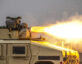 Image of a tube-launched, optically-tracked, wireless-guided 2b missile being launched.