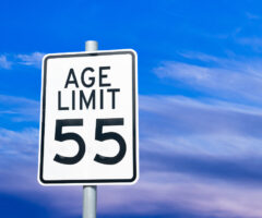 speed limit sign reads "age limit: 55"