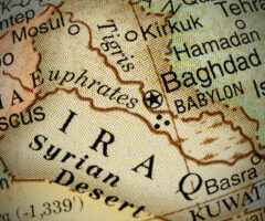 A detailed map section showing parts of Iraq and Syria. Key locations include Baghdad, Babylon, and the Euphrates River. The map features geographical labels and outlines, with surrounding areas like the Syrian Desert and cities such as Mosul and Aleppo. The design includes a vintage style with a textured appearance.