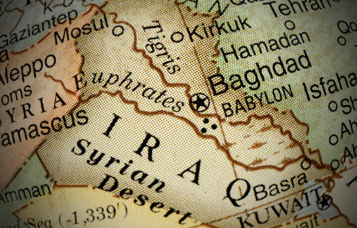 A detailed map section showing parts of Iraq and Syria. Key locations include Baghdad, Babylon, and the Euphrates River. The map features geographical labels and outlines, with surrounding areas like the Syrian Desert and cities such as Mosul and Aleppo. The design includes a vintage style with a textured appearance.
